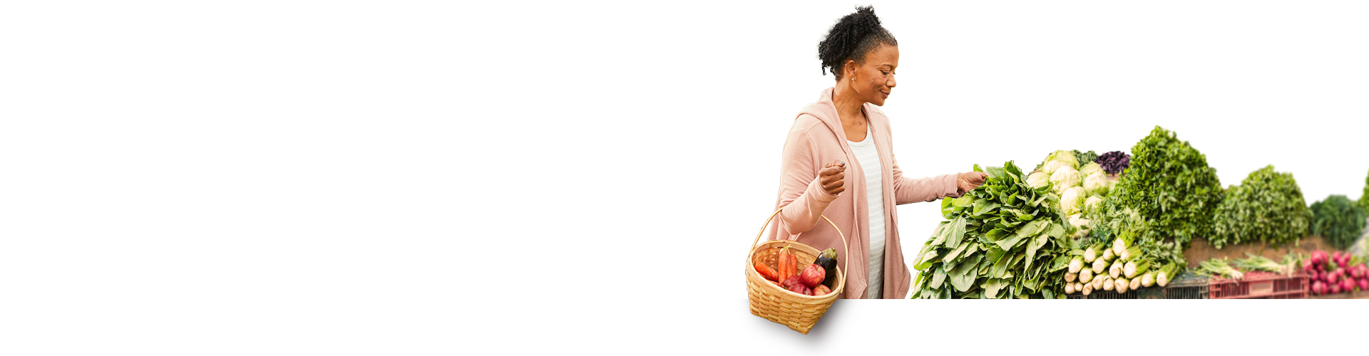Woman in farmer’s market shopping for vegetables